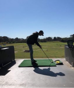 Robert Hill playing golf